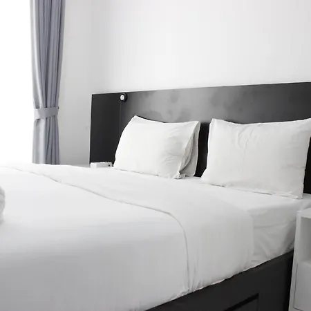 Monochrome Style Studio Room @Grand Asia Afrika Apartment By Travelio